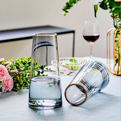 China Art Decor Wholesale European Small Living Room Glass Dining Table Vase Mouth Home Flower Bottle Crafts for sale