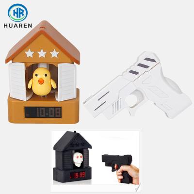 China Novelty Toy Funny Shot The Bird Home Decorative Cute Animal Shaped Cuckoo Alarm Clock for sale