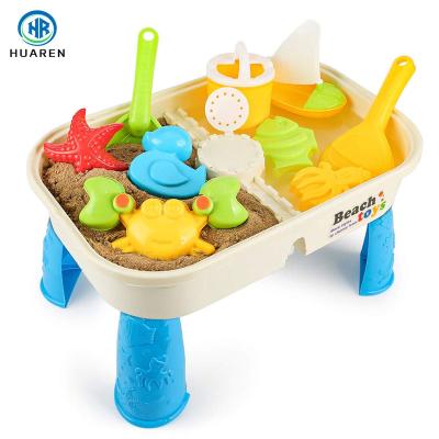 China Wonderful Gift Outdoor Summer Toy Kids Plastic Activity Beach Toy Sand Table for Children with Storage Room and Cover for sale