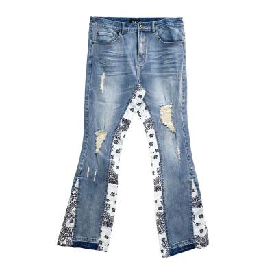 China Custom fashion stitching decoration QUICK DRY washripped casual looser waist men streetwear flared jeans for sale