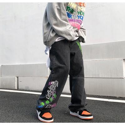 China QUICK DRY Brand INS hip hop mark high street graffiti sense design jeans male straight loose pants for sale