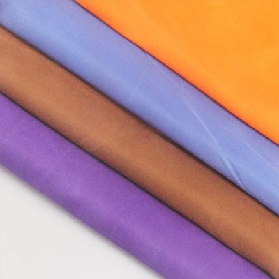 China Shaoxing factory cheap 100% keqiao waterproof polyester satin stock 50*75 fabric shiny polyester satin for decorative wrapping for sale