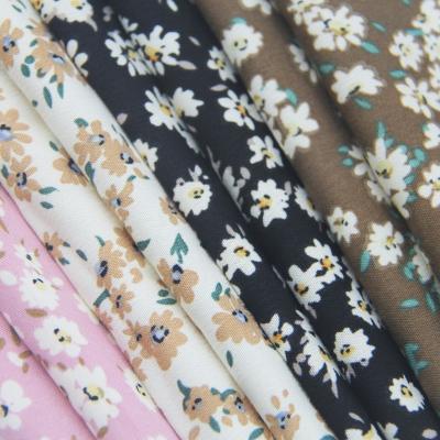 China Good sales memory 100d polyester spandex elastic four ways stretch print stock fabric for make dress for sale