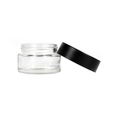 China Child Resist Cap Glass Weed Jar 1oz Airtight canabiss Jar With Childproof Lid for sale