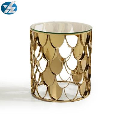 China Minimalist Design Living Room Metal Fish Scale Round Center Glass Coffee Table for sale