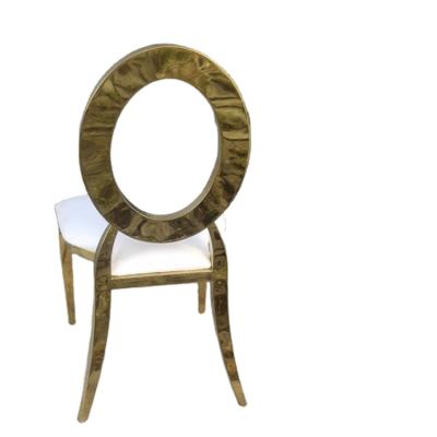 China Modern Modern Stacking Stainless Wedding Dining Chairs With Hole Shape Back for sale