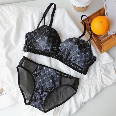 China Breathable Custom Letter Printed Radio Labeled Push Up Transparent Sexy Bralette Women Bra Briefs Underwear Sets for sale