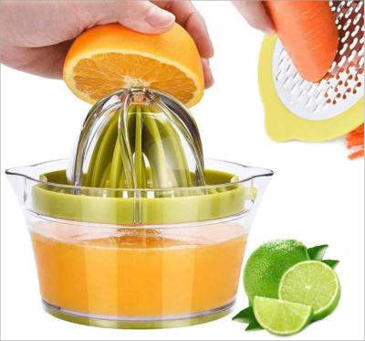 China Citrus Lemon Orange Juicer Hand Stocked Manual Squeezer with Built-in Measuring Cup and Grater for sale