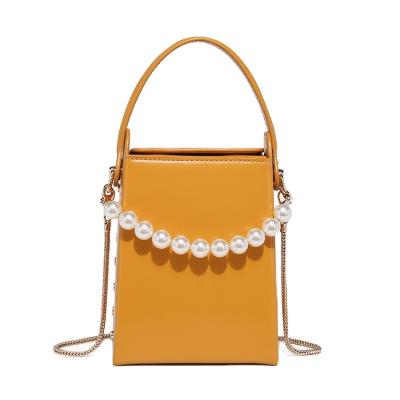 China ANG Bag Fashion Trends Minimalism Fresh Soft Women Handbags Fashoion Pearl Chain Mini Messenger Lady Bag for sale