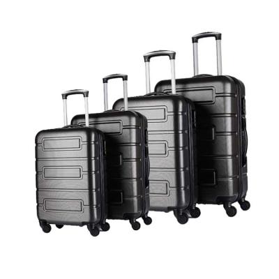 China Custom Logo ABS 4 Pcs Suitcase Travel Bag With Wheels 4 Pcs Black Luggage Set for sale