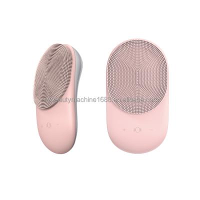 China Acne Treatment Mini Portable Silicone Face Brush Cleaner Electric Silicone Face Cleansing Brush for sale