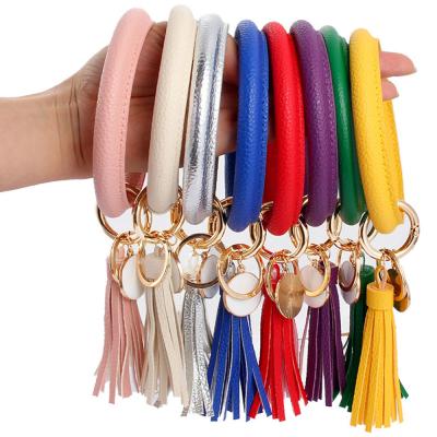 China Women Key Ring Keyring Wholesale Women's Tassel Key Chain Pendant Key Chains Bracelets For Religious PU Leather Bracelet Fashion Tassel Bracelet for sale