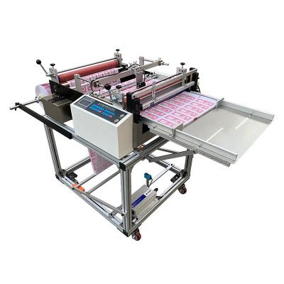 China Garment Shops Automatic Unwinding Electric Eye Color Placing Paper PVC Printed Film Roll To Sheet Cutting Machine for sale