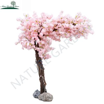 China Real Touch Cheap Indoor Outdoor Artificial Sakura Plants For Home Pink Cherry Blossom Tree Party Decoration Centerpiece for sale