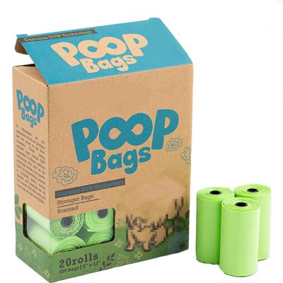 China 20 rolls eco-friendly sustainable strong and leak proof 15 micron scented poo bags with dispenser for sale