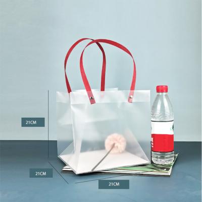 China Custom Clear Plastic Shopping Bag Logo Simplicity Luxury Reusable Tote Security Christmas Wholesale Gift Shopping Bag for sale