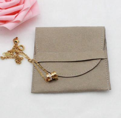 China 12*10cm custom logo gold deboss printing microfiber wrap jewelry pouch accept custom made for sale