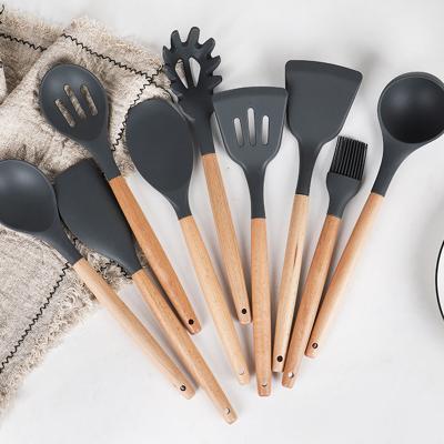 China Sustainable 9 Pieces In 1 Set Silicone Kitchen Accessories Cooking Tools Kitchenware Silicone Kitchen Utensils With Wooden Handles for sale