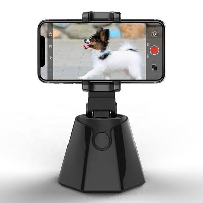 China ABS 360 Degree Rotating Virtual Man Tracking Phone Holder Blue Tooth Camera Lens for sale