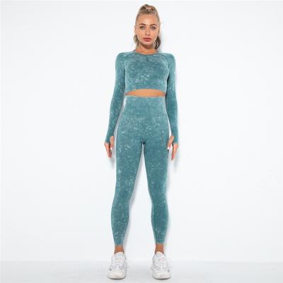 China New Women Face Fitness Seamless Washable Smile Sexy Hip Antibacterial Yoga Suit Long Sleeve Running Activewear 2 Piece Legging Set for sale