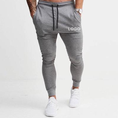 China Logo Solid Cotton Men Jogger Customized Anti-Static Pants Skinny Drawstring Jogging Sweatpants Sport Running Wear Men Slim Fit Soft Pants for sale