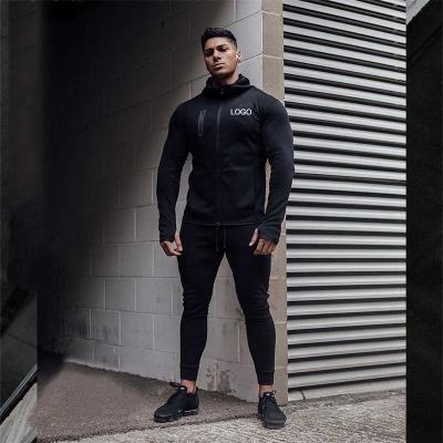 China Custom Antibacterial Logo Blank Mens Athletic Track Suits With Hoodie Cotton Plain Jogging Sweatsuit Men Running Sports Wear Wholesale for sale