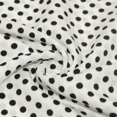 China Shrink-resistant 115gsm 100% white rayon women floral dress silky polka dot printed fabric for sale