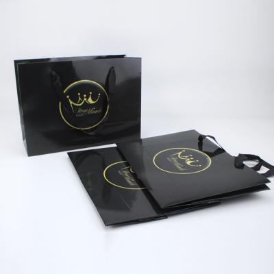 China Recycled Materials Fast Customized Shipping 250Gsm Recyclable Paper Gift Bags With Your Own Logo for sale