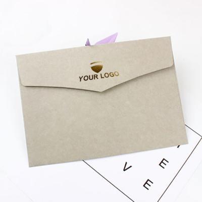 China Materials that respect the environment. Non-toxic Custom Luxury White Logo Printed Cream Color Packaging Paper Envelope For Wedding for sale