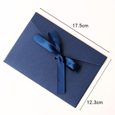 China Materials that respect the environment. Non-Toxic Custom Logo Printed Dark Blue Paper Shipping Envelope With Ribbon for sale