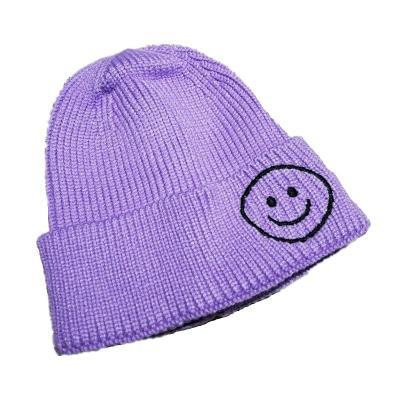 China Skin-friendly warm baby classic knitted wool hat smiling face high quality hat and winter female hat for sale