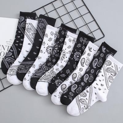 China Antibacterial hot sale yeezy bandana socks hip hop streetwear cotton funky black white crew socks for sale