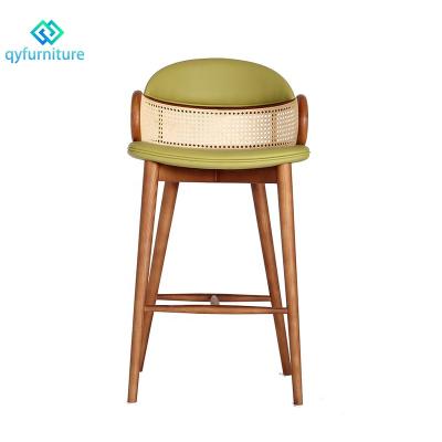 China Mid Century Modern High End Rattan Cane Wooden Bar Stools Chairs With Leather Seat for sale