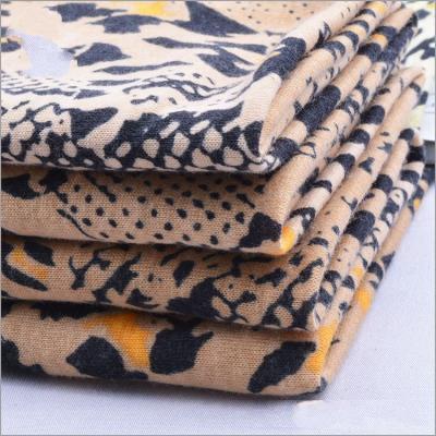 China Rusha Textile   Super Soft Poly Spun Single Jersey Snakeskin Printed Spandex Fabric for sale