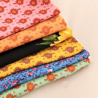 China Online Stock Lot Vintage Floral Clothes Textiles Woven 100 Rayon Print Fabric For Shirt for sale