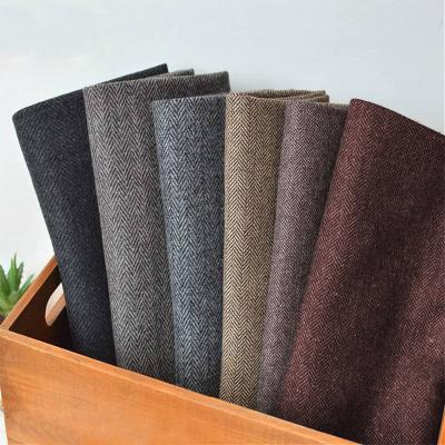 China Best Selling Thin Woolen 50% Wool 25% Viscose 25% Nylon Herringbone Fabric for sale