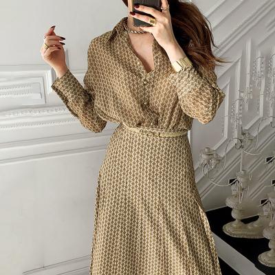 China 2022 Viable Wholesale Straight Abstract Autumn Temperament Printing Long Sleeve Shirt And High-waist Pleated Skirt Women Sets for sale