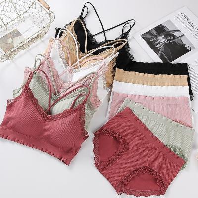 China Beautiful Seamless Wholesale Back Wrapped Chest Bottoming Vest Radio Lift Up Lace Trim Bra Briefs Sets for sale