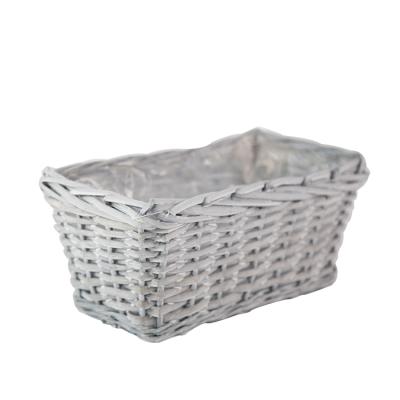 China Modern Inexpensive Hand - Woven Wicker Storage Baskets For Garden Flower Planters for sale