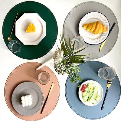 China YY Dinner Table Mats Heat Resistant Non-Slip Washable Sustainable Faux Leather Place Mat Coasters Round Place Pad for sale