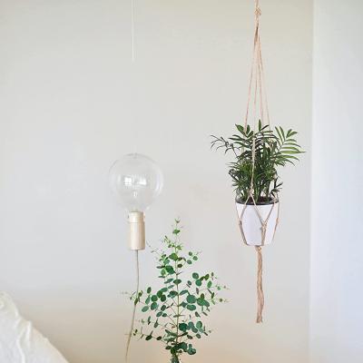 China Macrame Plant Hanger Flower Pot Basket Hemp Rope Balcony Decor Modern Knotted Hanging Flower Pots Rack for sale