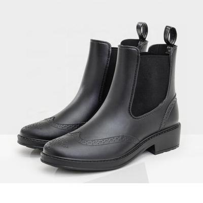 China Fashion Trend Black Women Waterproof Anti Slip Ankle Handmade PVC Rain Boots for sale