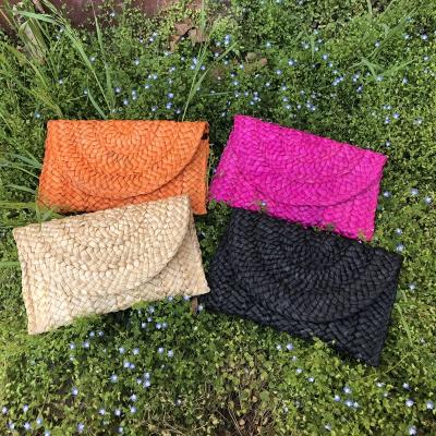 China 2021 Eco-friendly Summer Beach Bag Manufacturers Wholesale 100% Woven Straw Bag Clutch Purses Te koop