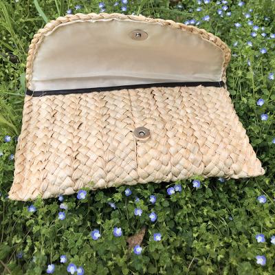 China 100% Eco-friendly Handmade Ladies Straw Clutch Beach Rattan Bag Straw Woven Women Handbags Summer Beach Bag à venda