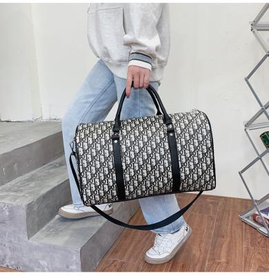 China Fashion Sports Large Tote Gym Bag Shoulder Space Weekender Letter Printing Traveling Bag for sale