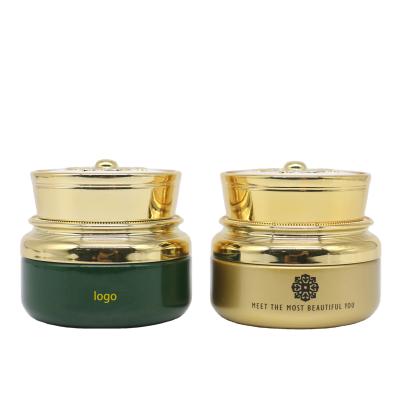 China 1oz/30g 50g Cosmetic Luxury Empty Green Coated Cosmetic Glass Jar With Gold Lid And Spoon For Cream for sale