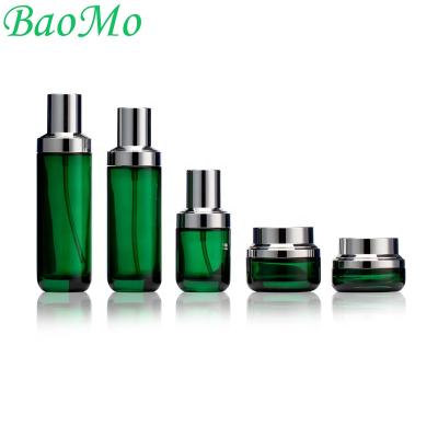 China New and luxury 30g 50g 40ml 100ml 120ml empty luxury green cosmetic creams glass bottles and jars for cosmetic packaging for sale