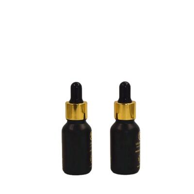 China Personal Care Cosmetic Packaging 15ml Black Glass Essential Oil Dropper Bottle For Essential Oil With Gold Dropper for sale