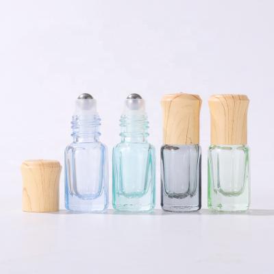 China 10ml Small Cosmetic Popular Clear Colorful Essential Oil Perfume Glass Bottle With Steel Roll On Cap For Cosmetic Packaging for sale