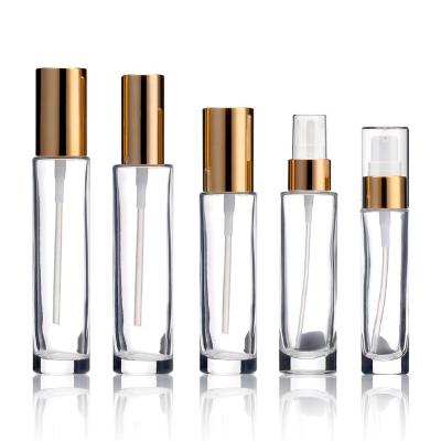 China Cosmetic Hot Sales Lightweight Perfume Glass Bottles Packaging For Cosmetics 1oz Round Shape Glass Spray Flat Perfume Bottle With Pump for sale